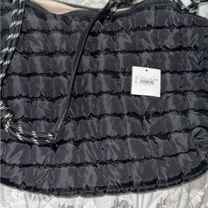 Altared State puffer purse.